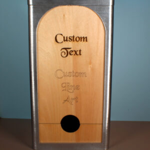 A 3 liter box for bag-in-the-box wine. The box has a silver frame and an engraved oak panel with the words "Custom Text" on it.