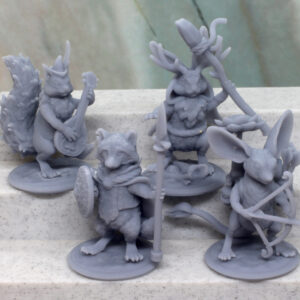 Four 3D-printed tabletop miniatures in gray resin. The figures are anthropomorphic animals in the roles of common adventurers.